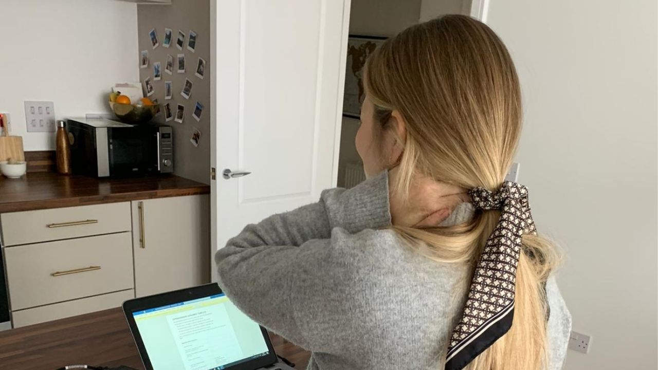 Team member working productively from home with a comfortable, ergonomic setup.