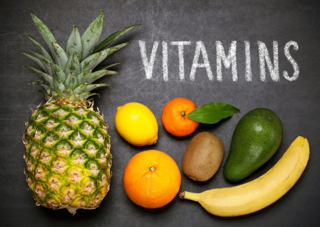 Vitamins-written-next-to-fruit