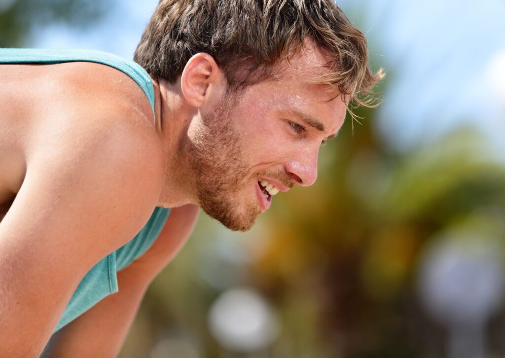 man sweating after exercise outside