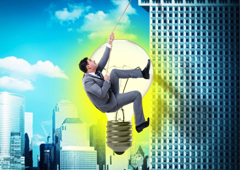Corporate-Wellness-challenge-ideas-blog-picture-man-climbing-corporate-building