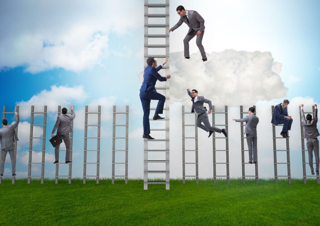 employees-climbing-ladders-to-show-career-progression
