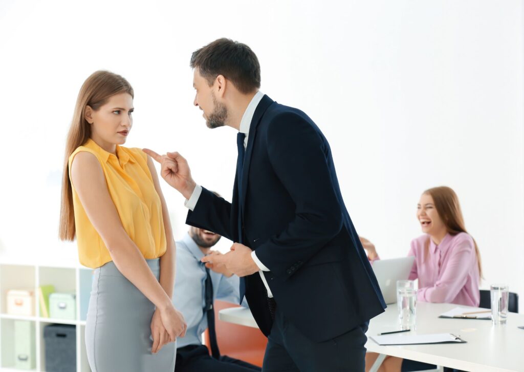 man-bullying-female-colleague