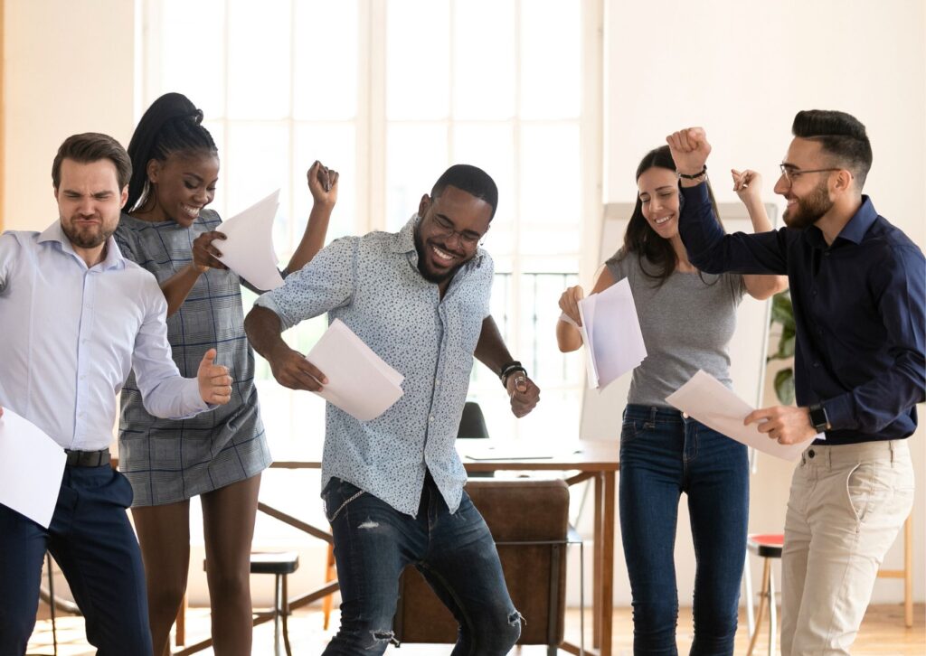 employees-at-work-dancing-and-celebrating