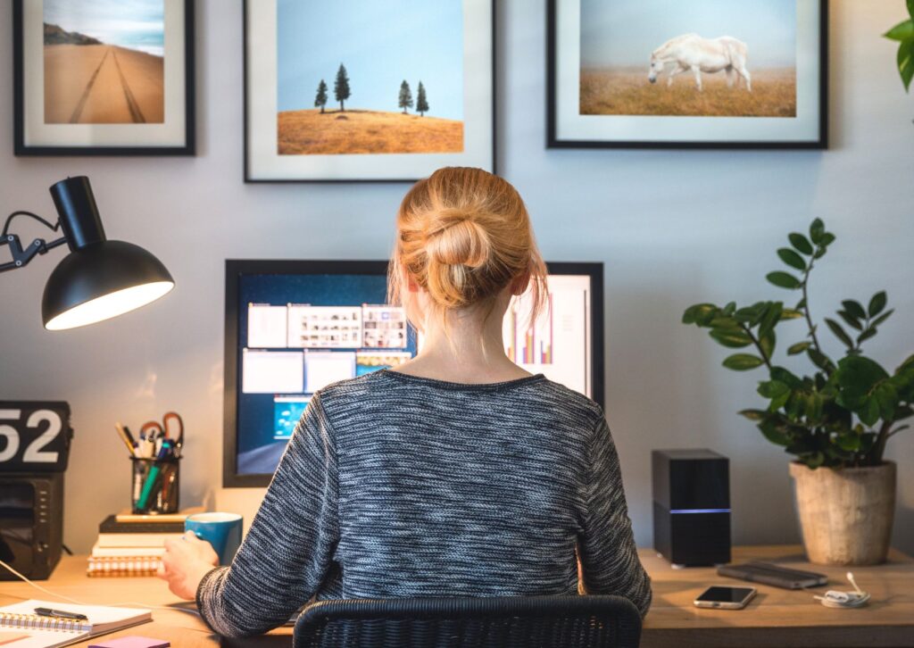 lady-working-from-home-looking-at-her-monitor