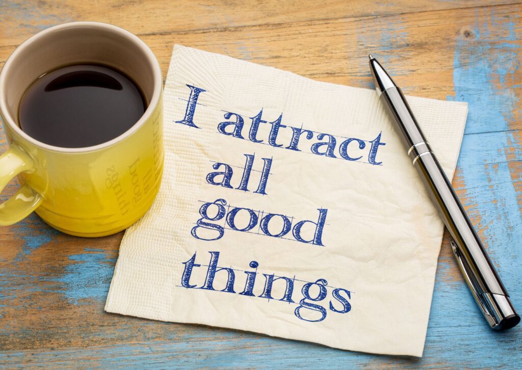 positive-affirmation-written-on-a-napkin-saying-i-attract-all-good-things