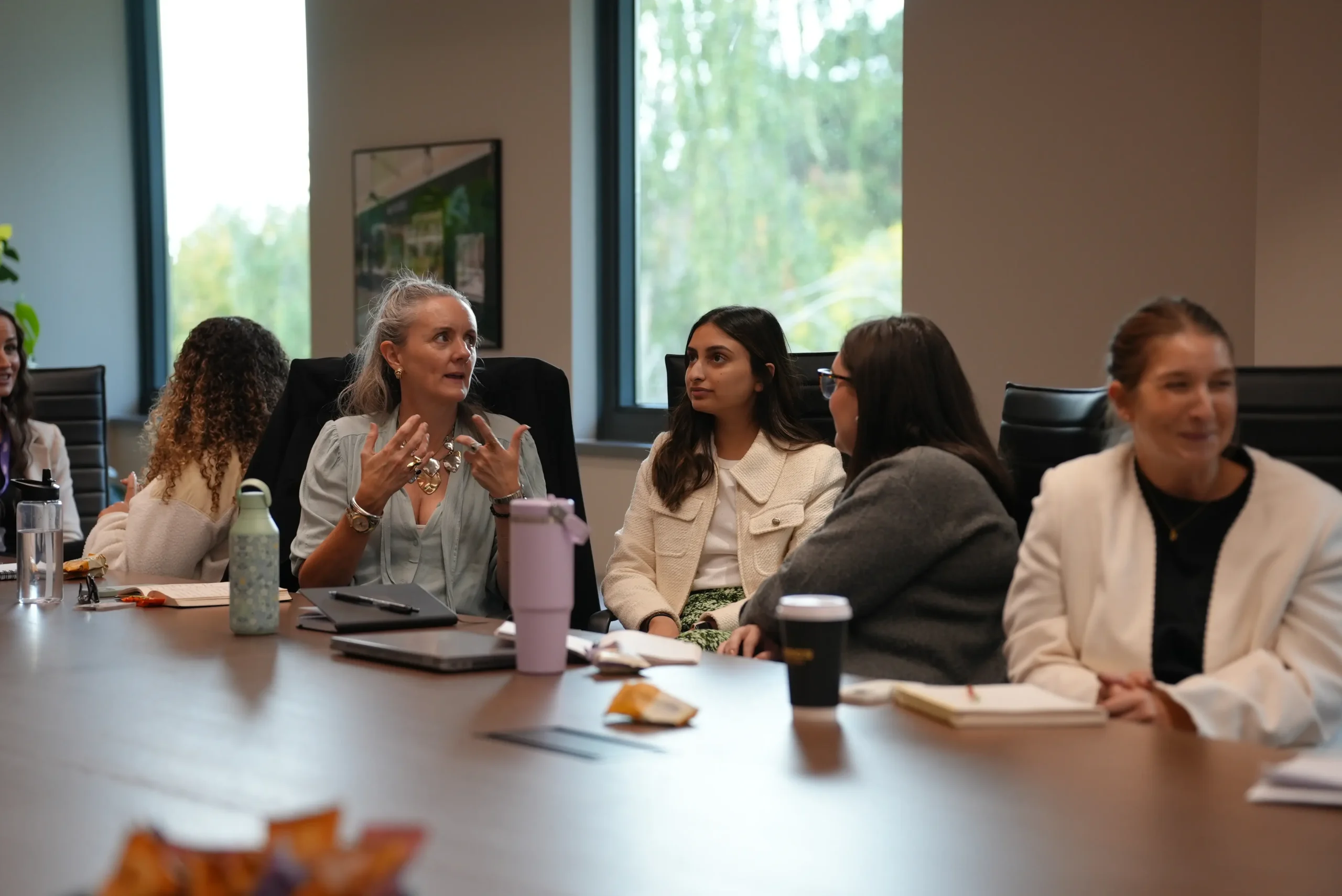 Employees discussing goal-setting topics together during a workshop.