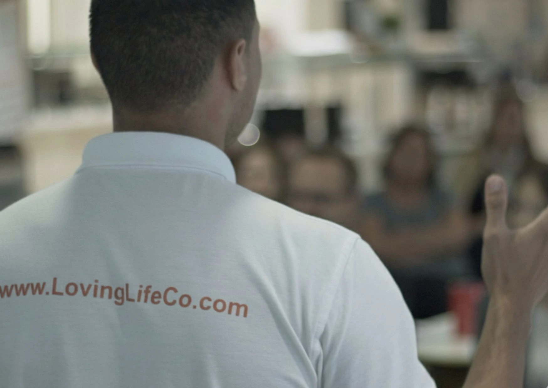 Facilitator delivering a confidence-building workshop to employees.